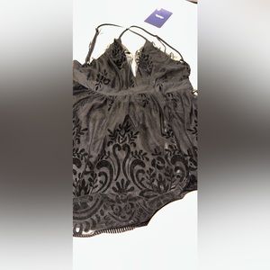 A new black lacy dress